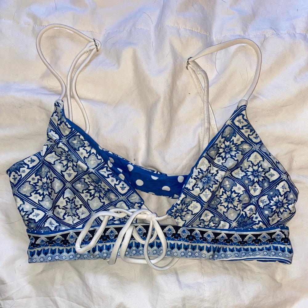 blue and white reversible bikini top.